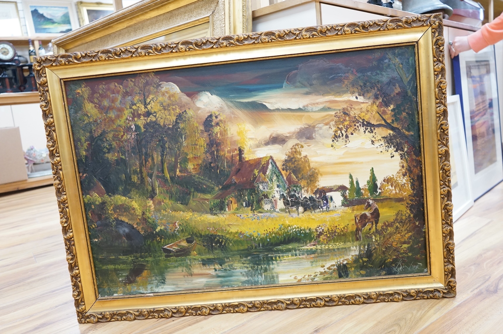 1970's, oil on canvas, Surreal scene with stream and horses before cottage, indistinctly signed, 59 x 90cm, ornate gilt frame